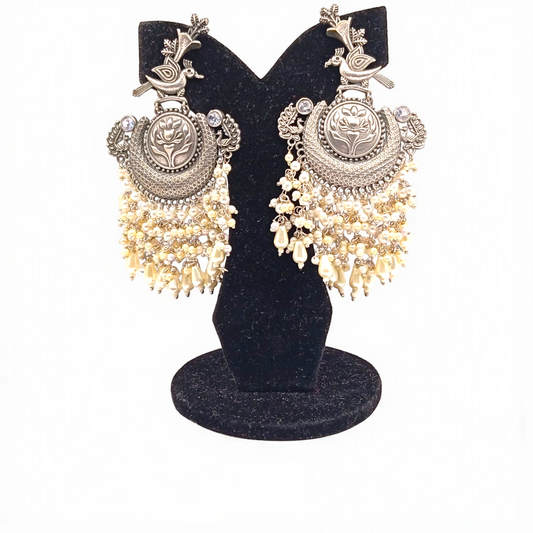 Oxidized Peacock Jhumka Earrings with Pearl Tassels