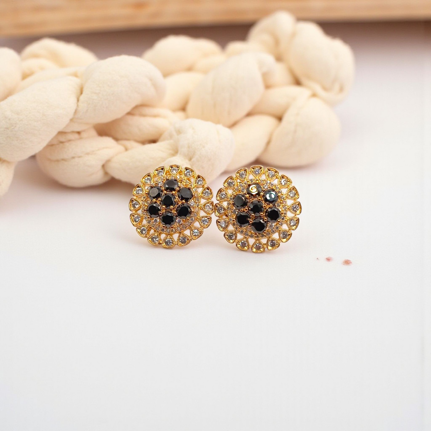 Gold Round Stud Earrings with Black and Clear Stones