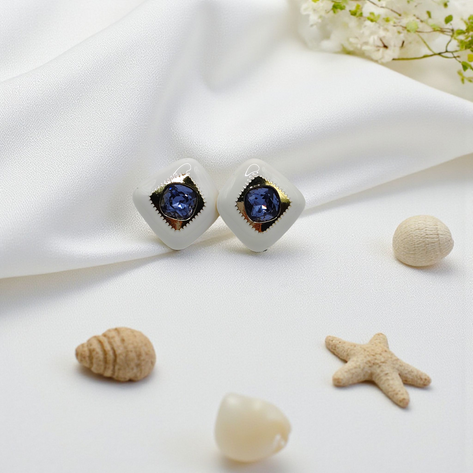 Elegant White Enamel Studs with Blue Gemstone